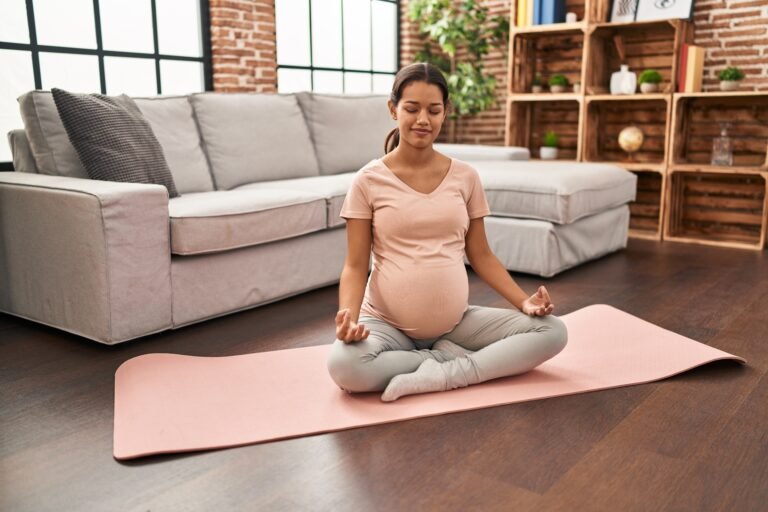 Pregnant woman practicing meditation for mental health and emotional well-being
